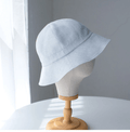 Custom linen bucket hat.