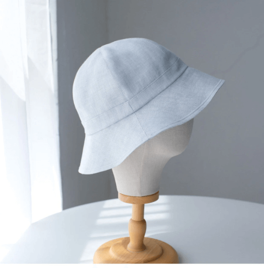 Custom linen bucket hat.