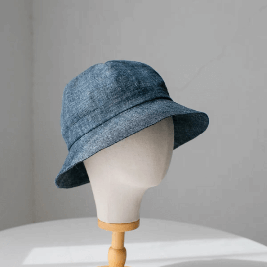 Custom linen bucket hat.