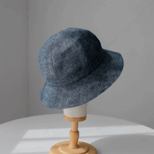Custom linen bucket hat.