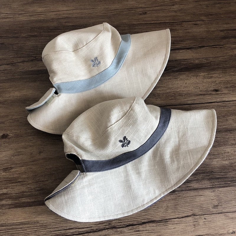 Reversible Pony Tail Sun Hat with Flower Print.