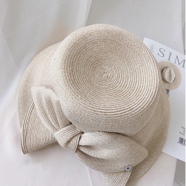 Wide Brim Straw Hat with Bow Tie for Women.